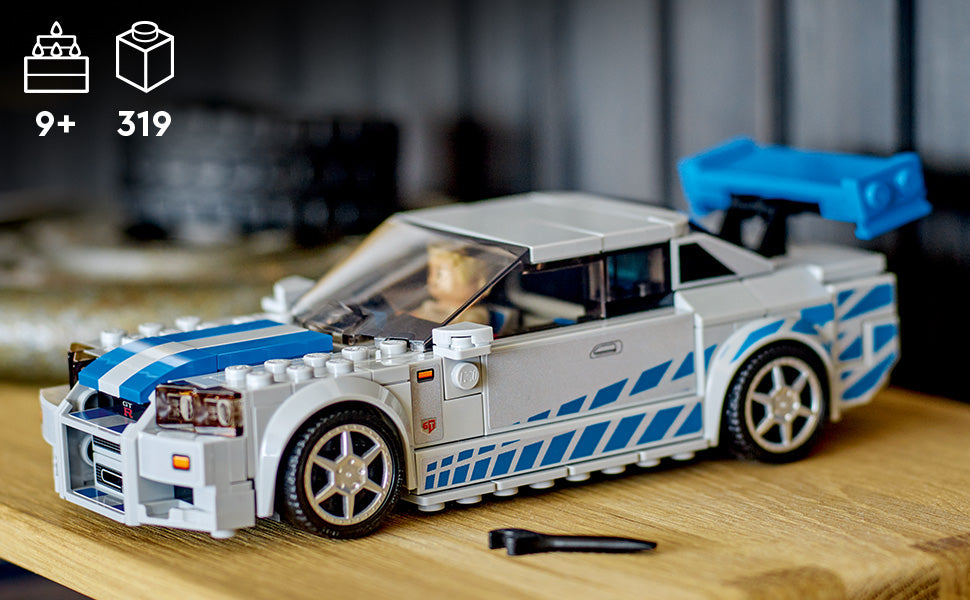 LEGO Speed Champions 2 Fast 2 Furious Nissan Skyline GT-R (R34) 76917 - kit de construcción de autos de carreras, coleccionable con minifigura Racer, juego 2023 para niños y niñas a partir de 9 años