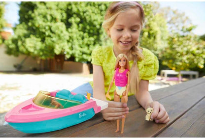 Muñeca Barbie y juego de barco con cachorro, chaleco salvavidas y a...