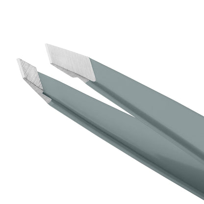 Tweezerman - Pinza para cejas inclinada Mist Blue de acero inoxidab...