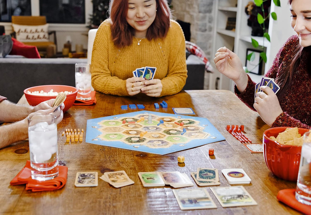 Juego de mesa CATAN - ¡Embárcate en un viaje de descubrimiento y co...