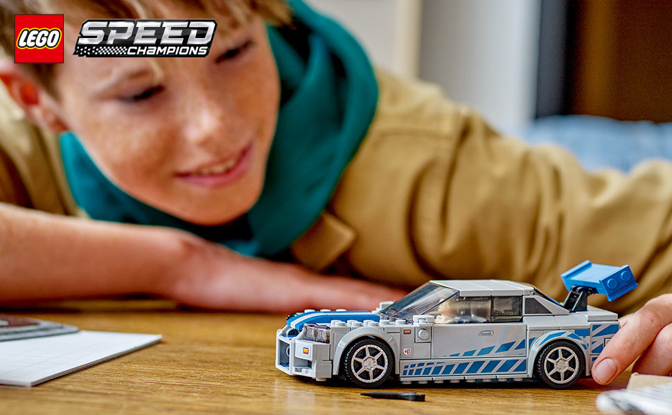 LEGO Speed Champions 2 Fast 2 Furious Nissan Skyline GT-R (R34) 76917 - kit de construcción de autos de carreras, coleccionable con minifigura Racer, juego 2023 para niños y niñas a partir de 9 años